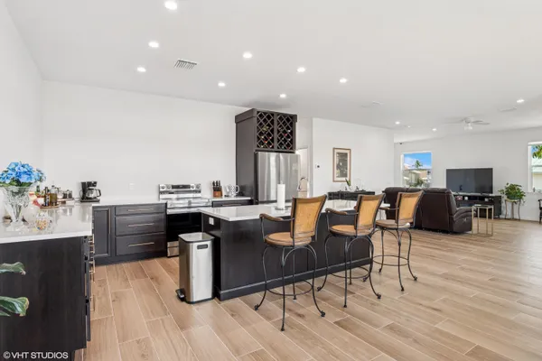 a kitchen with appliances and cabinets