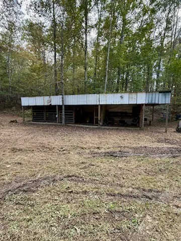a view of outdoor space and a yard