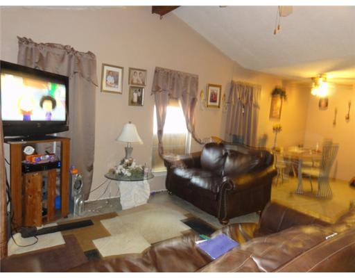 2554 Danforth Lane Ingleside, TX 78362 - Photo 3 of 10 a living room with furniture and a flat screen tv