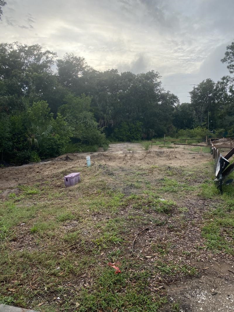 106 Ridgeway Road St. Augustine, FL 32080 - Photo 1 of 1 a backyard of a house with lots of green space