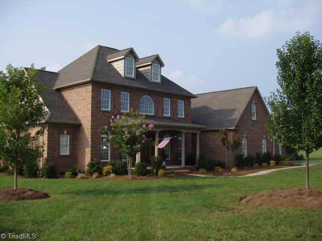 8204 Damson Court Oak Ridge, NC 27310 - Photo 1 of 7 Exterior Front.