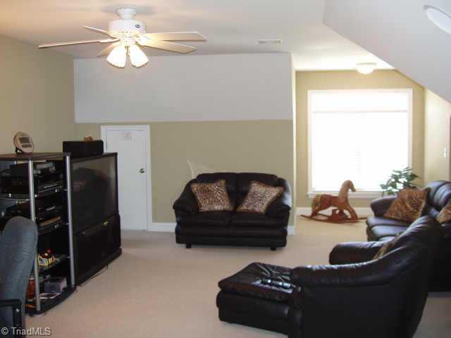 8204 Damson Court Oak Ridge, NC 27310 - Photo 6 of 7 Other. Bonus room features home theatre wiring complete with 4 in-ceiling speakers.