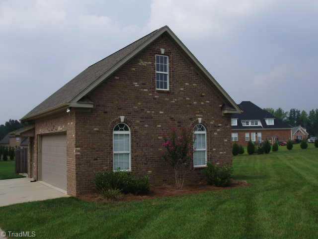 8204 Damson Court Oak Ridge, NC 27310 - Photo 7 of 7 Other. Detached garage is fully finished and insulated. Cable pre-wire, phone jack, insulated garage door, several 20 amp receptacles for power tools. Permanent stairs to fully floored attic.