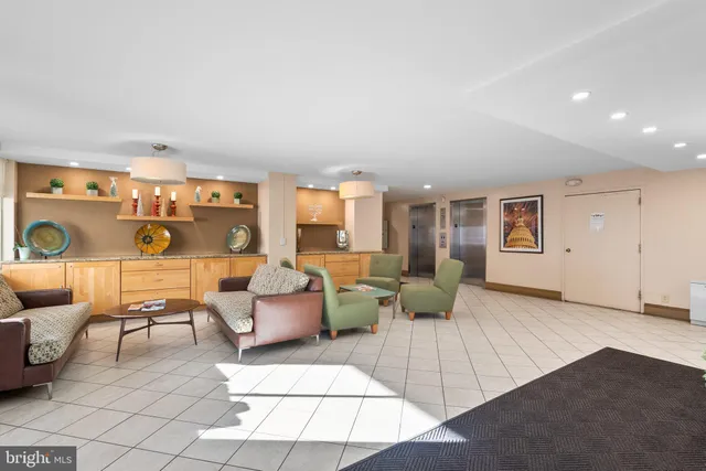 a living room with furniture and a table