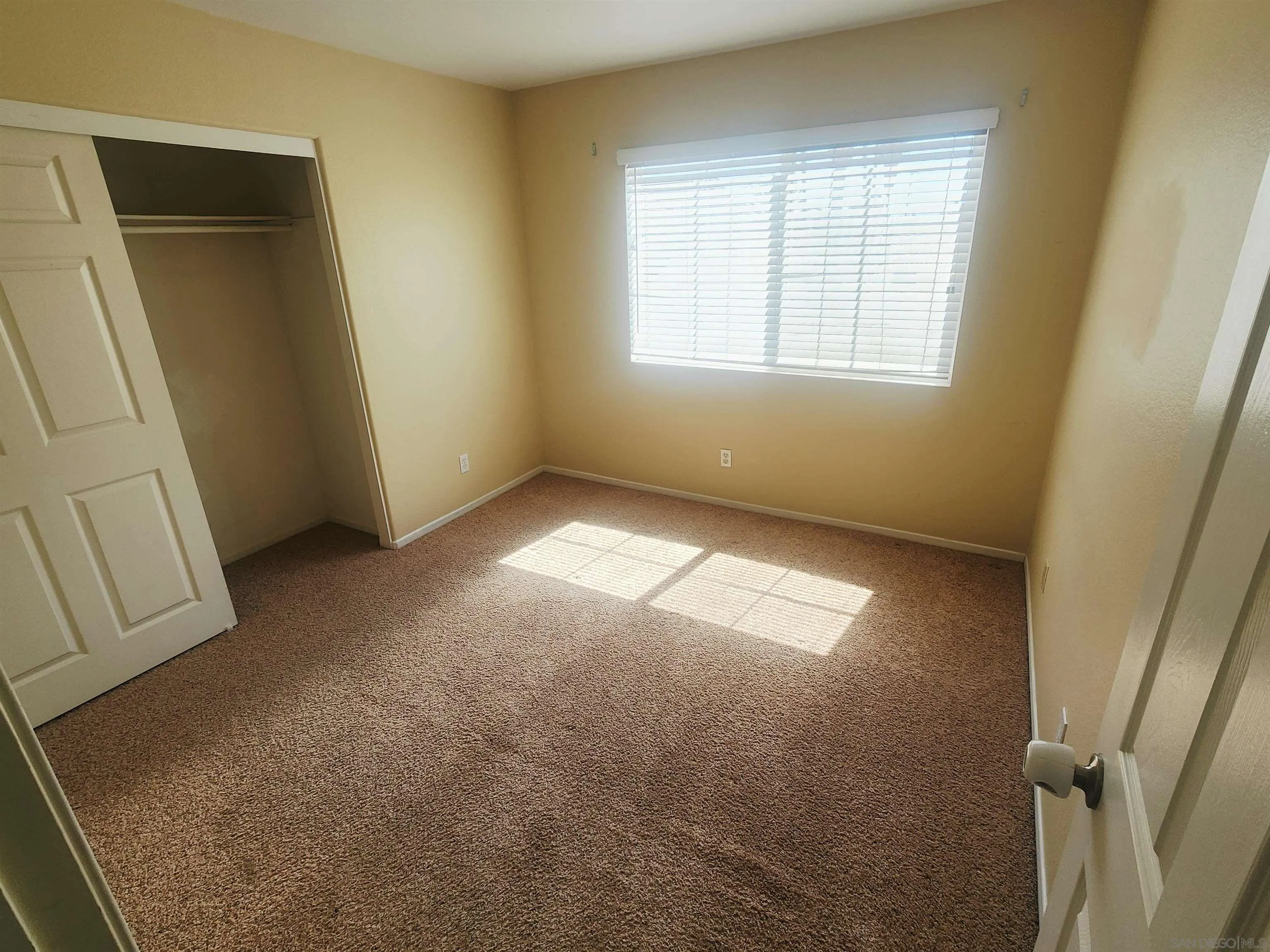 1330 Wendell Cutting Court El Cajon, CA 92021 - Photo 16 of 21 an empty room with windows