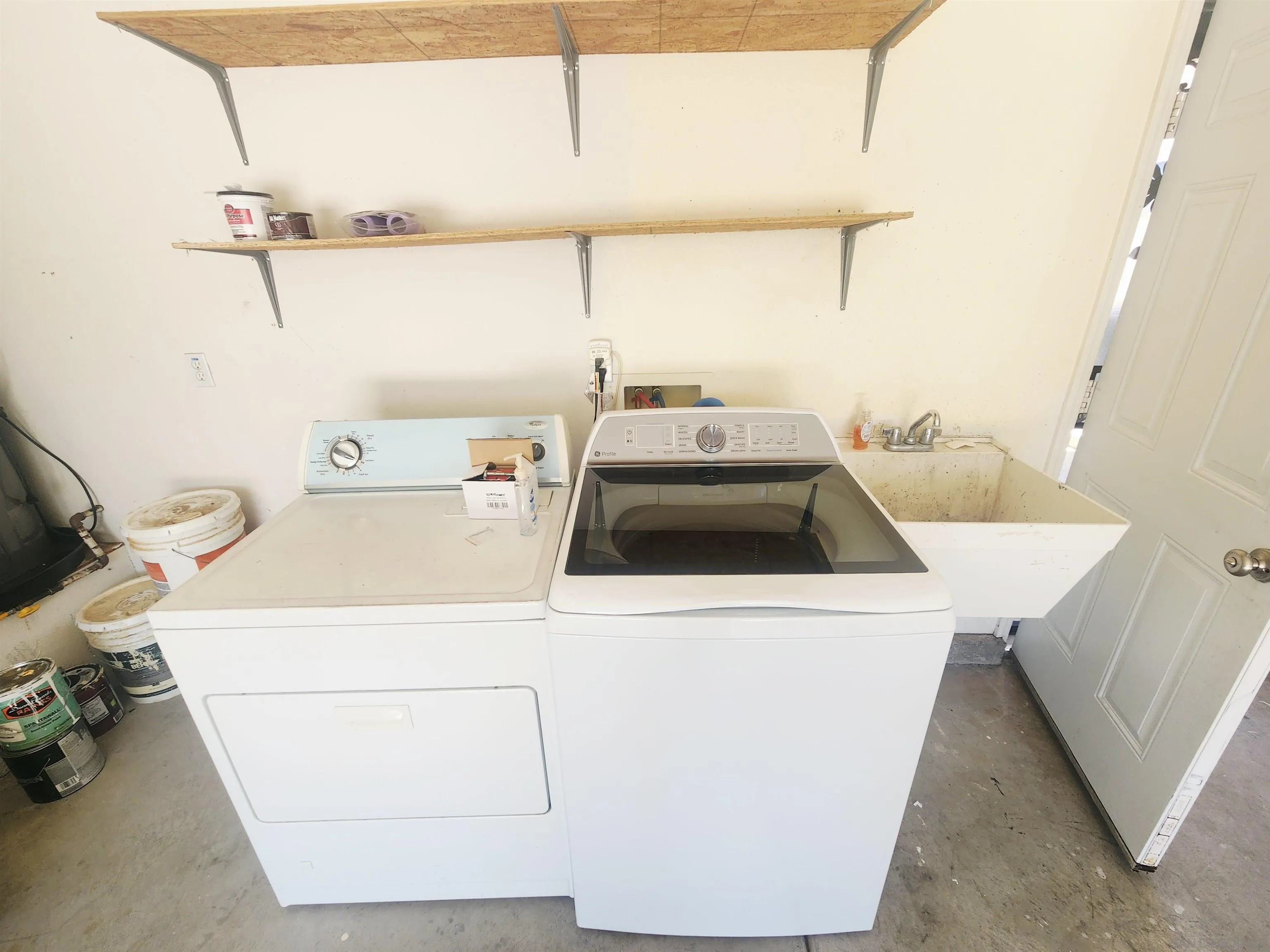 1330 Wendell Cutting Court El Cajon, CA 92021 - Photo 21 of 21 a utility room with dryer and washer