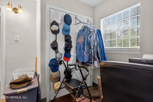 a backyard of a house with yard and outdoor seating