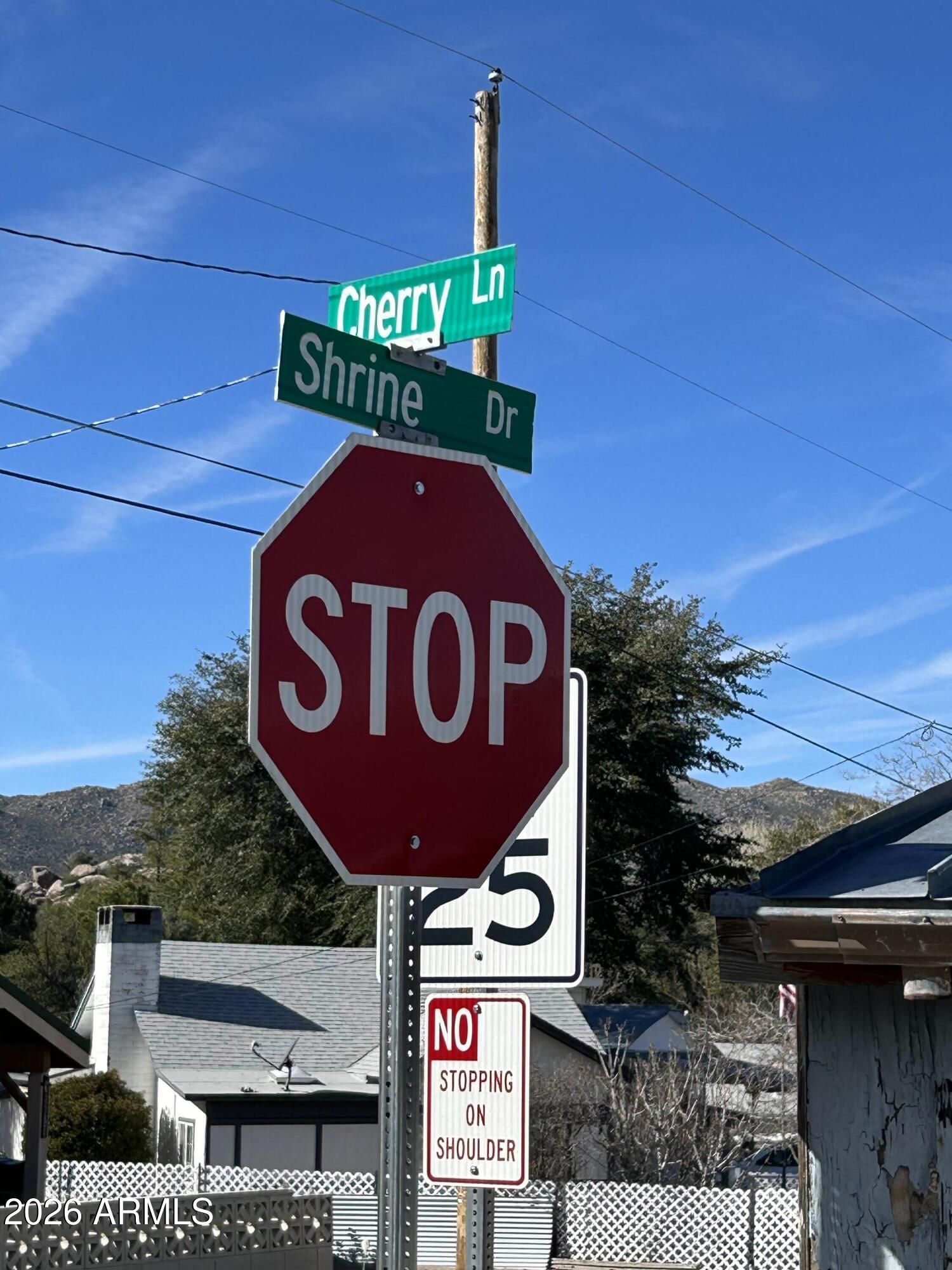 16614 Shrine Drive Yarnell, AZ 85362 - Photo 20 of 40 a close up of a street sign