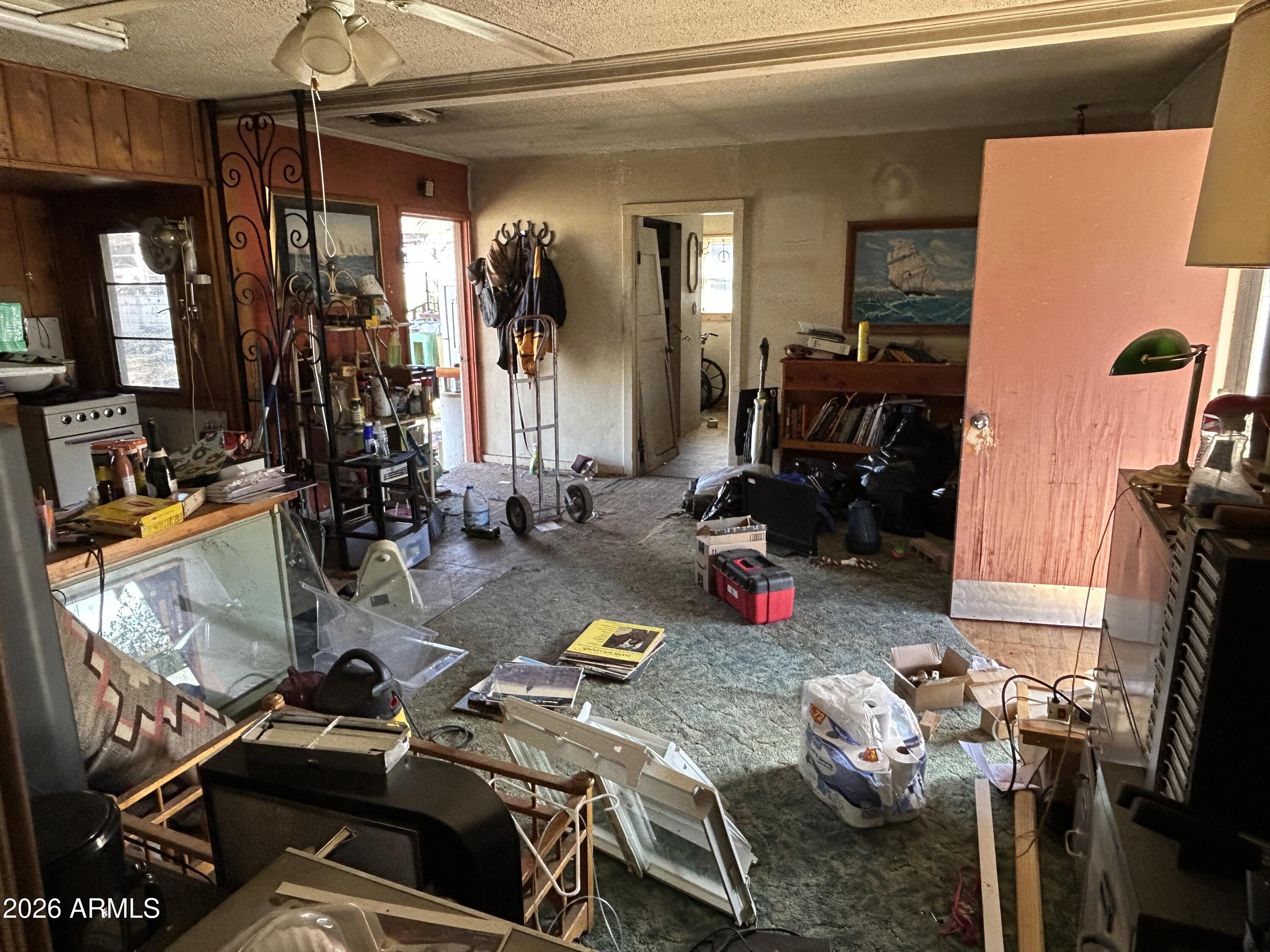 16614 Shrine Drive Yarnell, AZ 85362 - Photo 30 of 40 a living room with furniture a flat screen tv and a window