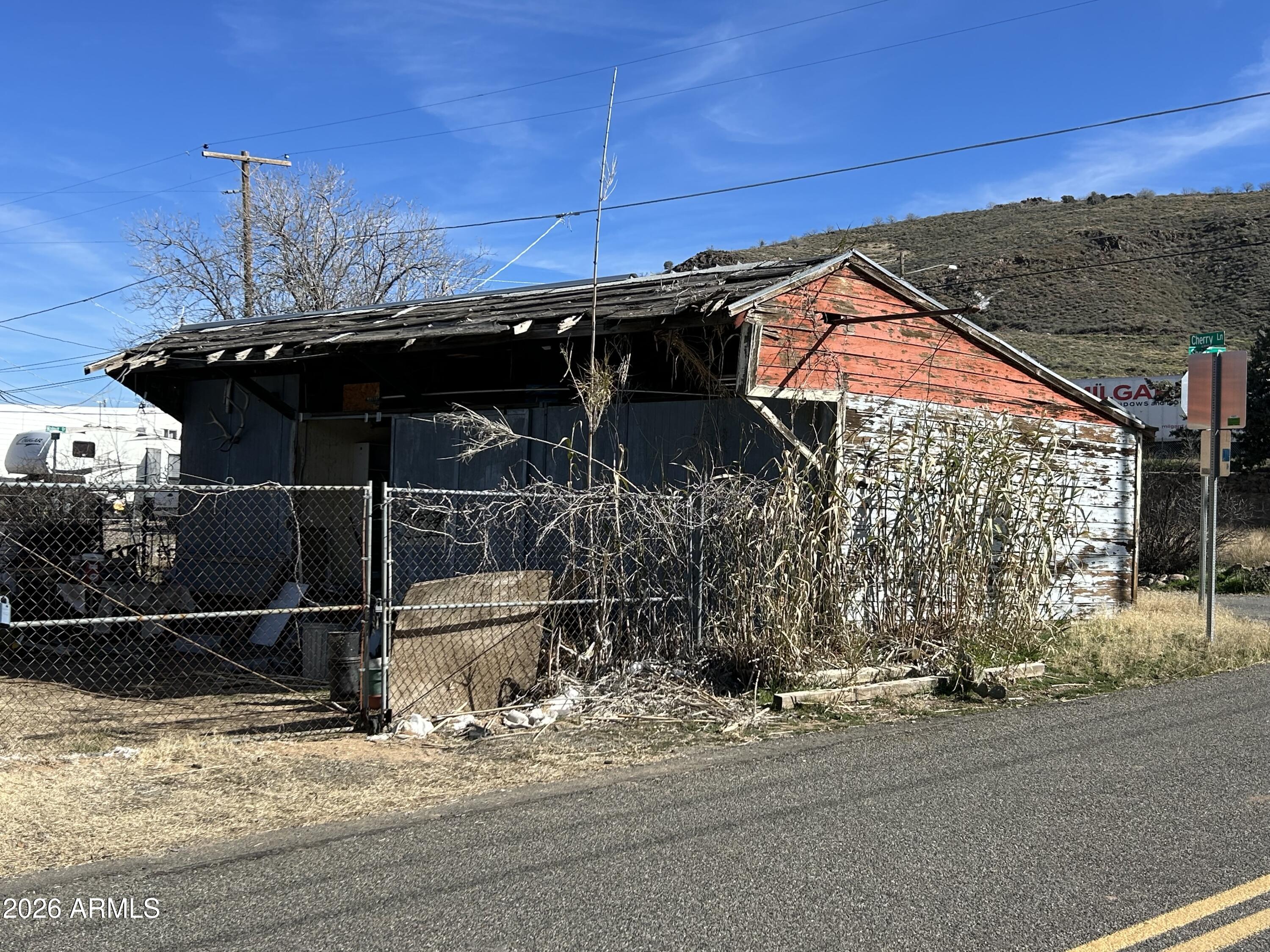 16614 Shrine Drive Yarnell, AZ 85362 - Photo 3 of 40 a backyard of a house with table and chairs