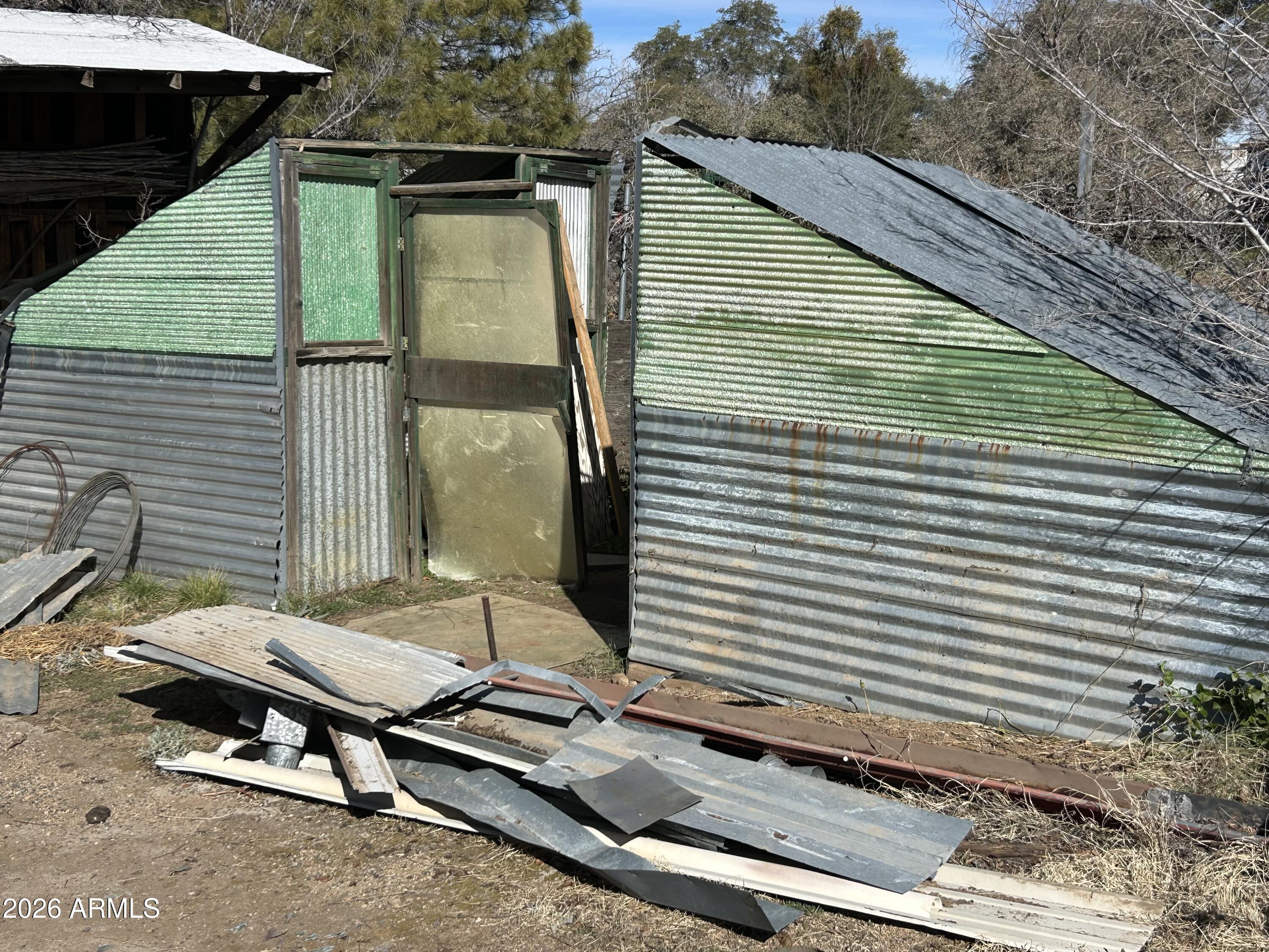 16614 Shrine Drive Yarnell, AZ 85362 - Photo 37 of 40 a backyard of a house with outdoor seating