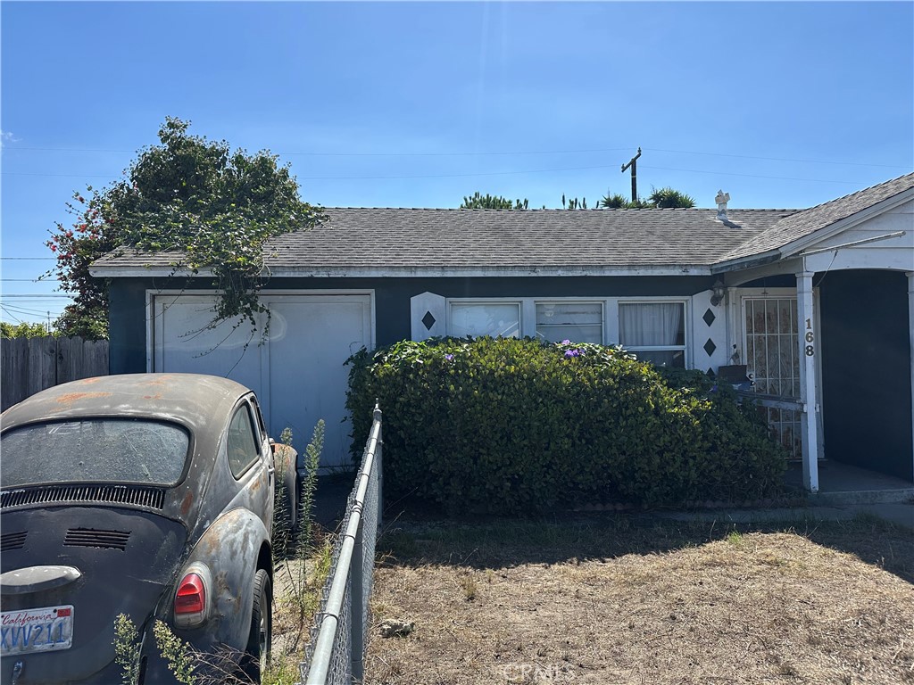 168 Lark Street Oxnard, CA 93033 - Photo 4 of 15 a front view of a house with garden