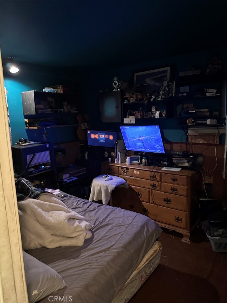 168 Lark Street Oxnard, CA 93033 - Photo 8 of 15 a bedroom with a bed and a closet