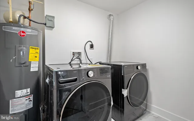 a utility room with dryer and washer