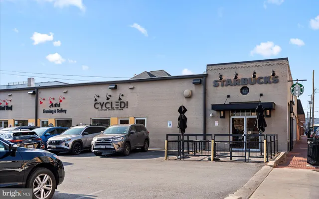 a car parked in front of a building