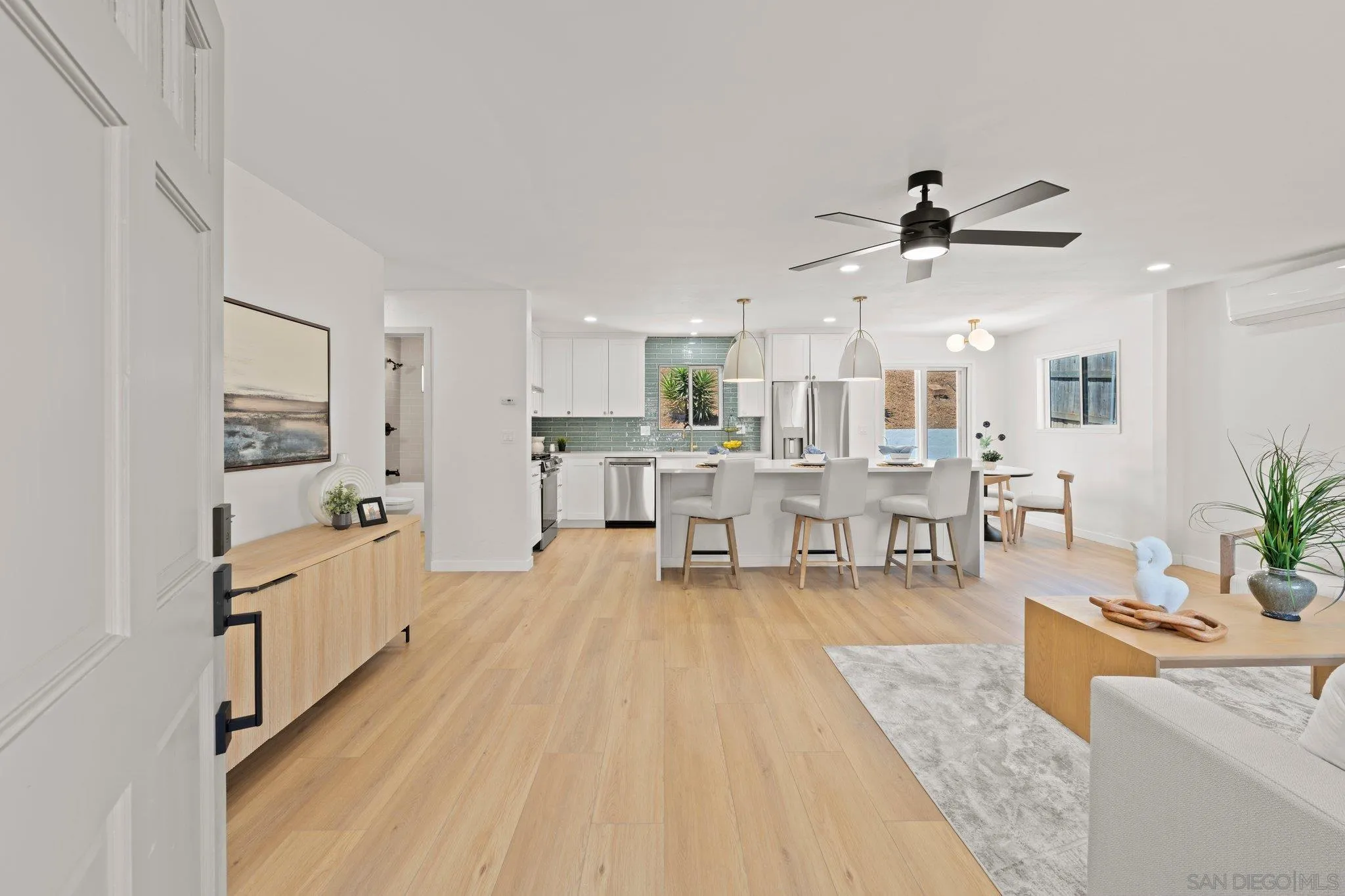 9117 Heatherdale Street Santee, CA 92071 - Photo 2 of 31 a living room with furniture and a large window