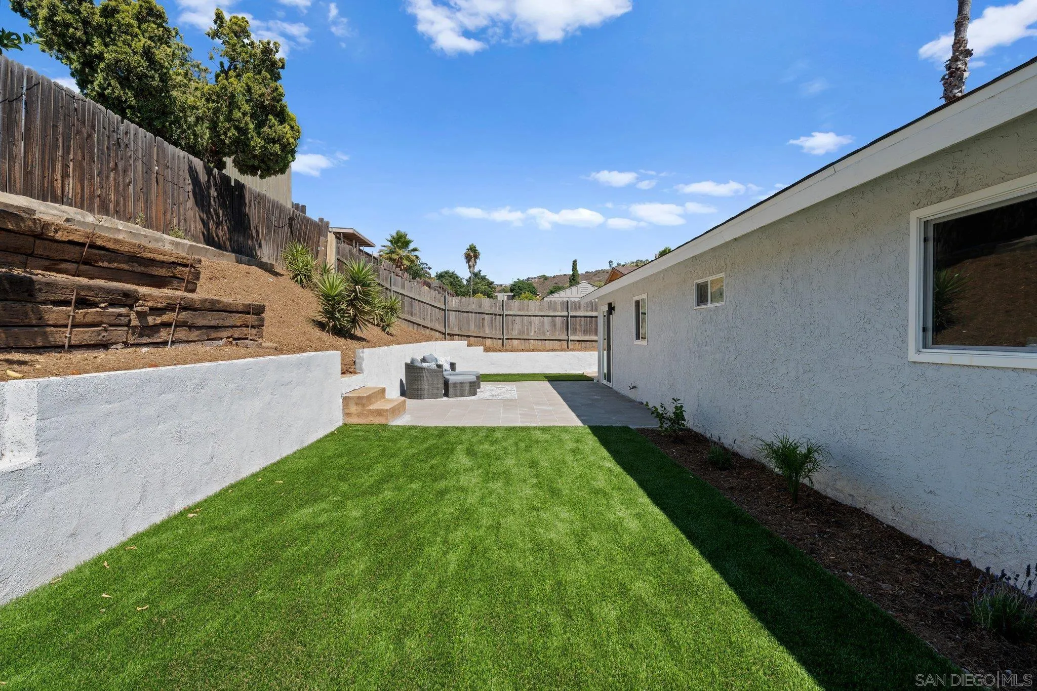 9117 Heatherdale Street Santee, CA 92071 - Photo 27 of 31 a view of back yard of the house