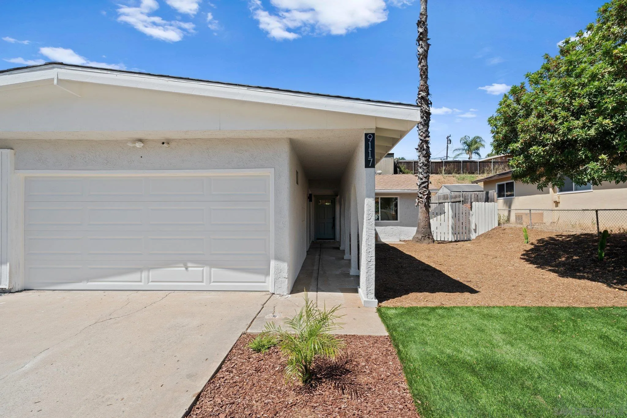 9117 Heatherdale Street Santee, CA 92071 - Photo 30 of 31 a front view of a house with a yard