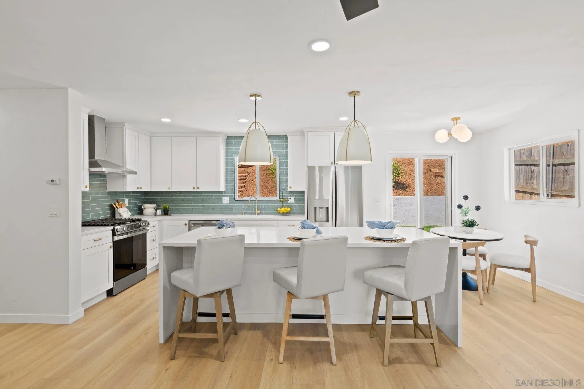 9117 Heatherdale Street Santee, CA 92071 - Photo 7 of 31 a view of a dining room with furniture