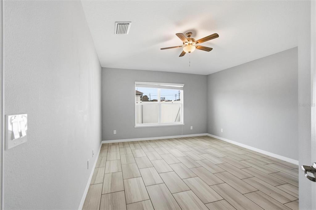 2 Lynton Place, Unit B Palm Coast, FL 32137 - Photo 29 of 51 a view of an empty room with a window