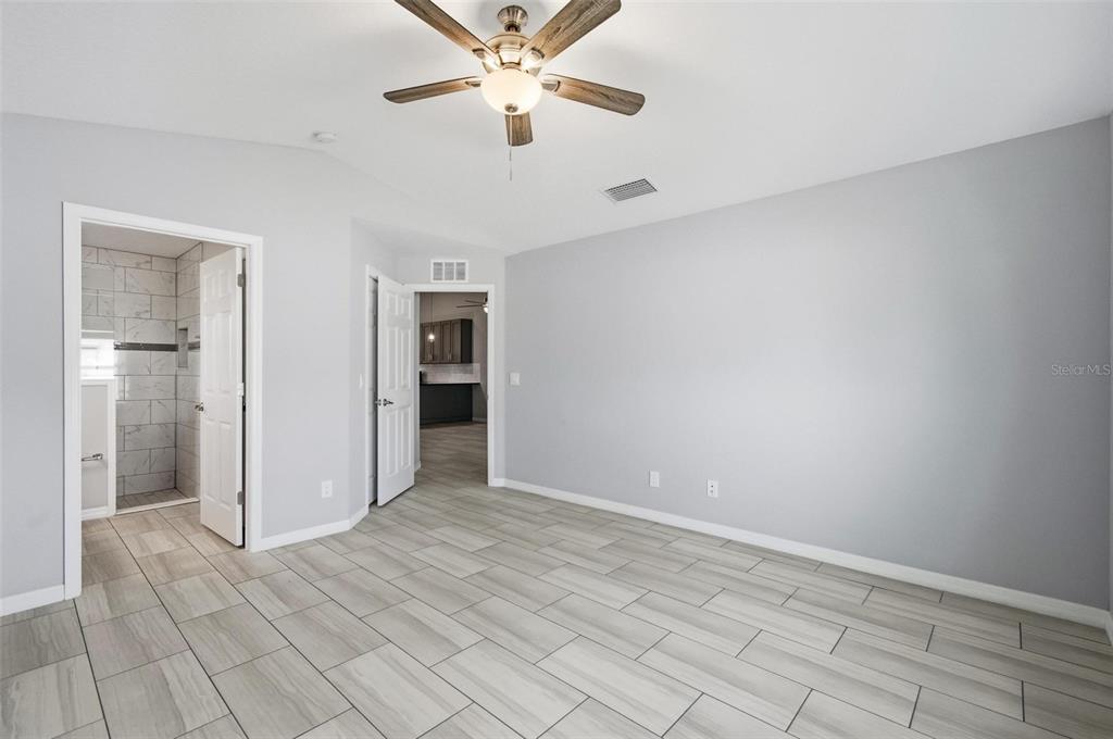 2 Lynton Place, Unit B Palm Coast, FL 32137 - Photo 31 of 51 a view of an empty room with a window