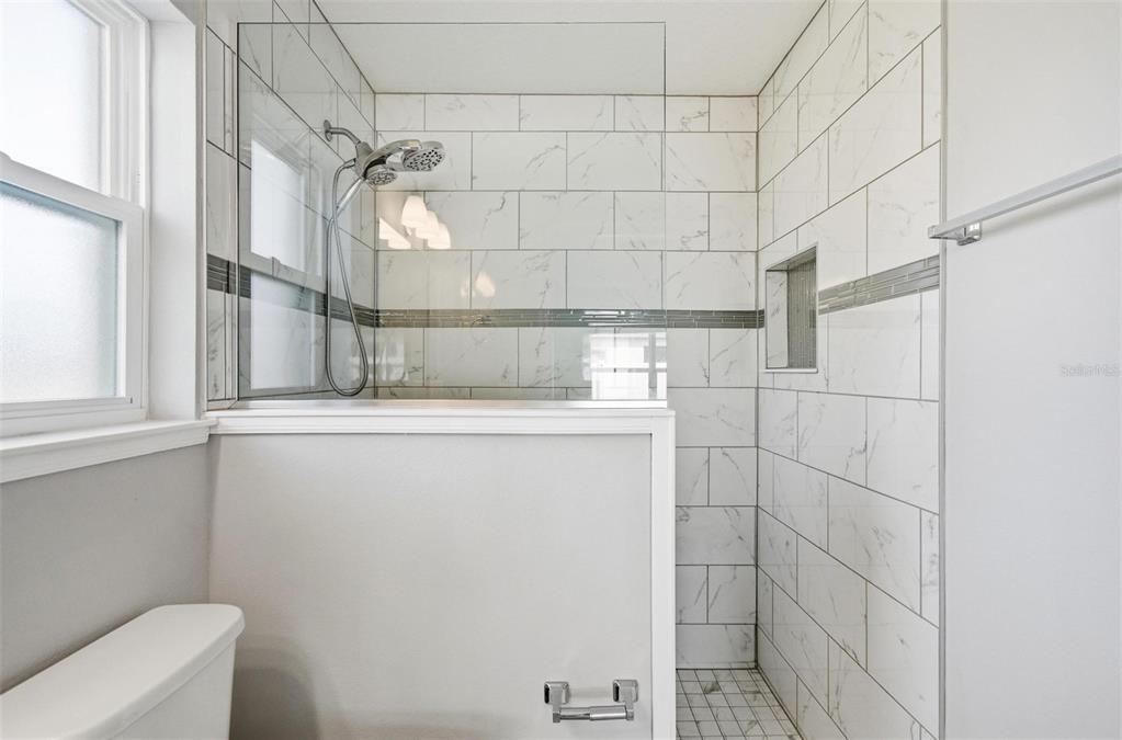 2 Lynton Place, Unit B Palm Coast, FL 32137 - Photo 33 of 51 a bathroom with a shower