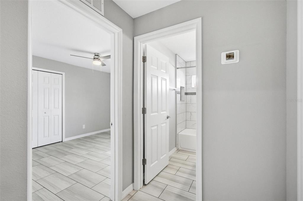 2 Lynton Place, Unit B Palm Coast, FL 32137 - Photo 39 of 51 a view of a bathroom from the hallway