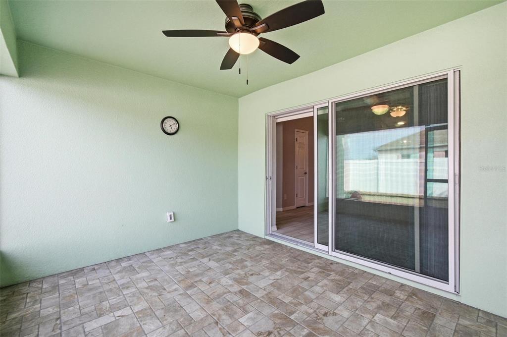 2 Lynton Place, Unit B Palm Coast, FL 32137 - Photo 48 of 51 en empty room with window and a ceiling fan