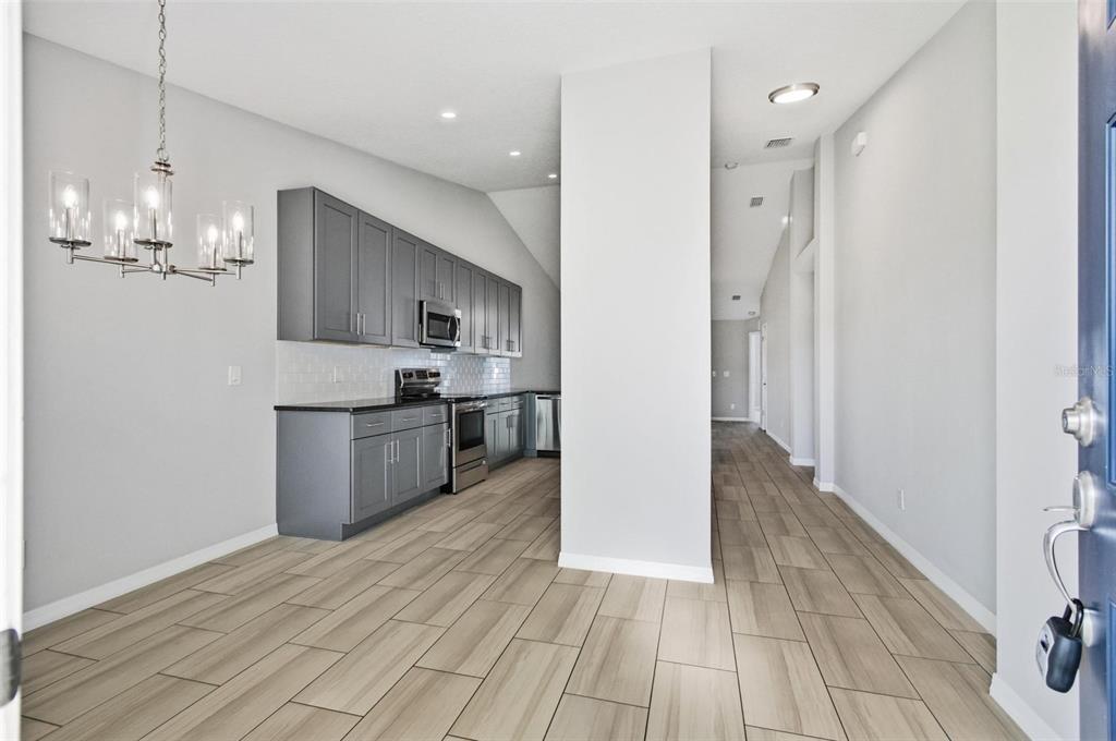 2 Lynton Place, Unit B Palm Coast, FL 32137 - Photo 8 of 51 a view of a kitchen from the hallway