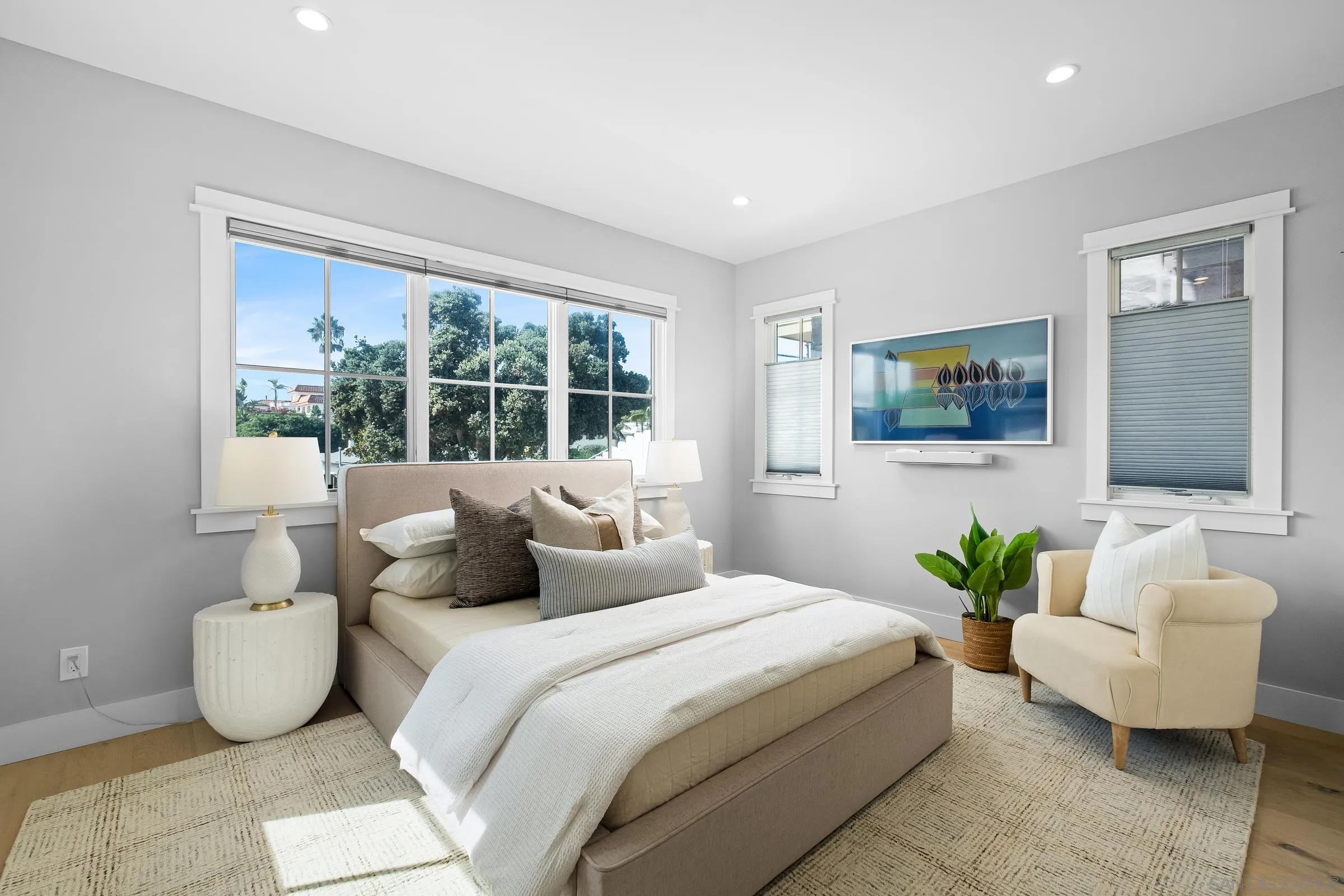 237 La Mesa Avenue Encinitas, CA 92024 - Photo 13 of 40 a bedroom with bed and a couch