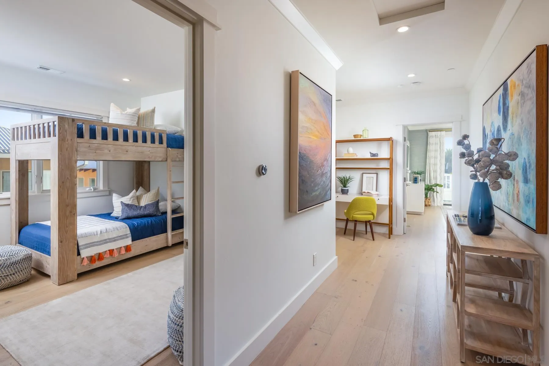 237 La Mesa Avenue Encinitas, CA 92024 - Photo 17 of 40 a bedroom with furniture and a mirror