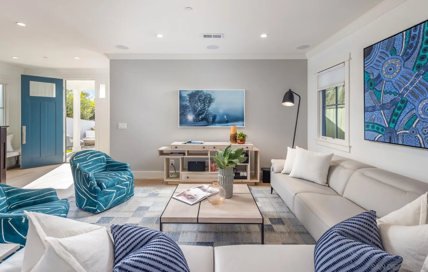 237 La Mesa Avenue Encinitas, CA 92024 - Photo 2 of 40 a living room with furniture and a couch