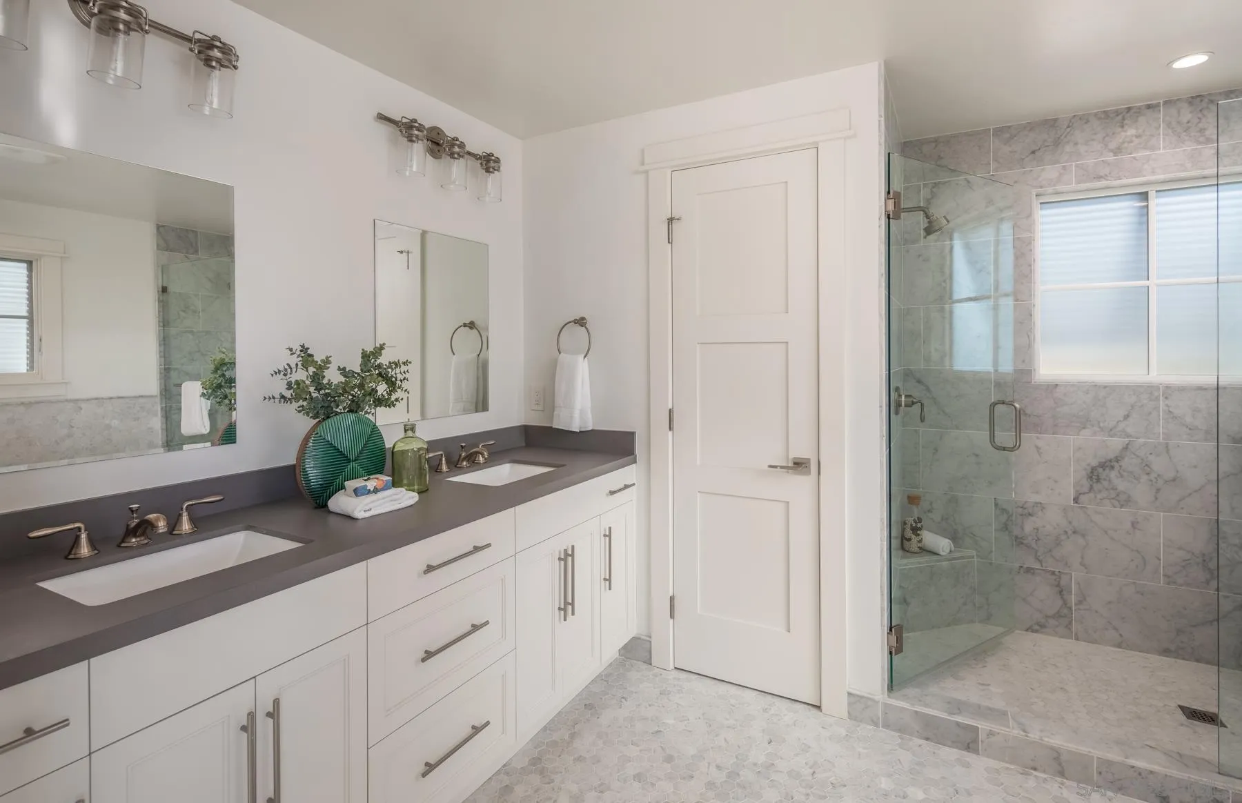 237 La Mesa Avenue Encinitas, CA 92024 - Photo 21 of 40 a spacious bathroom with a granite countertop sink mirror and shower