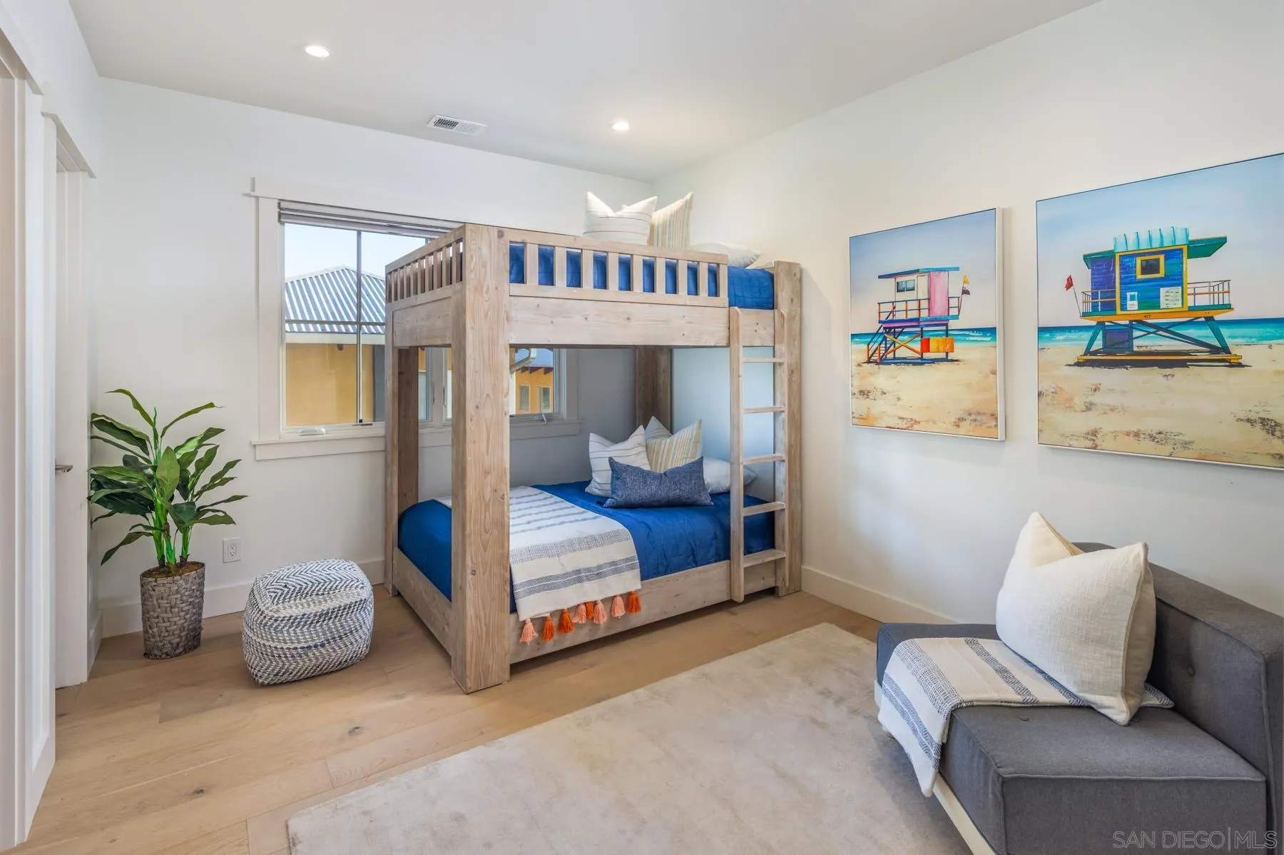 237 La Mesa Avenue Encinitas, CA 92024 - Photo 23 of 40 a living room with furniture and a potted plant