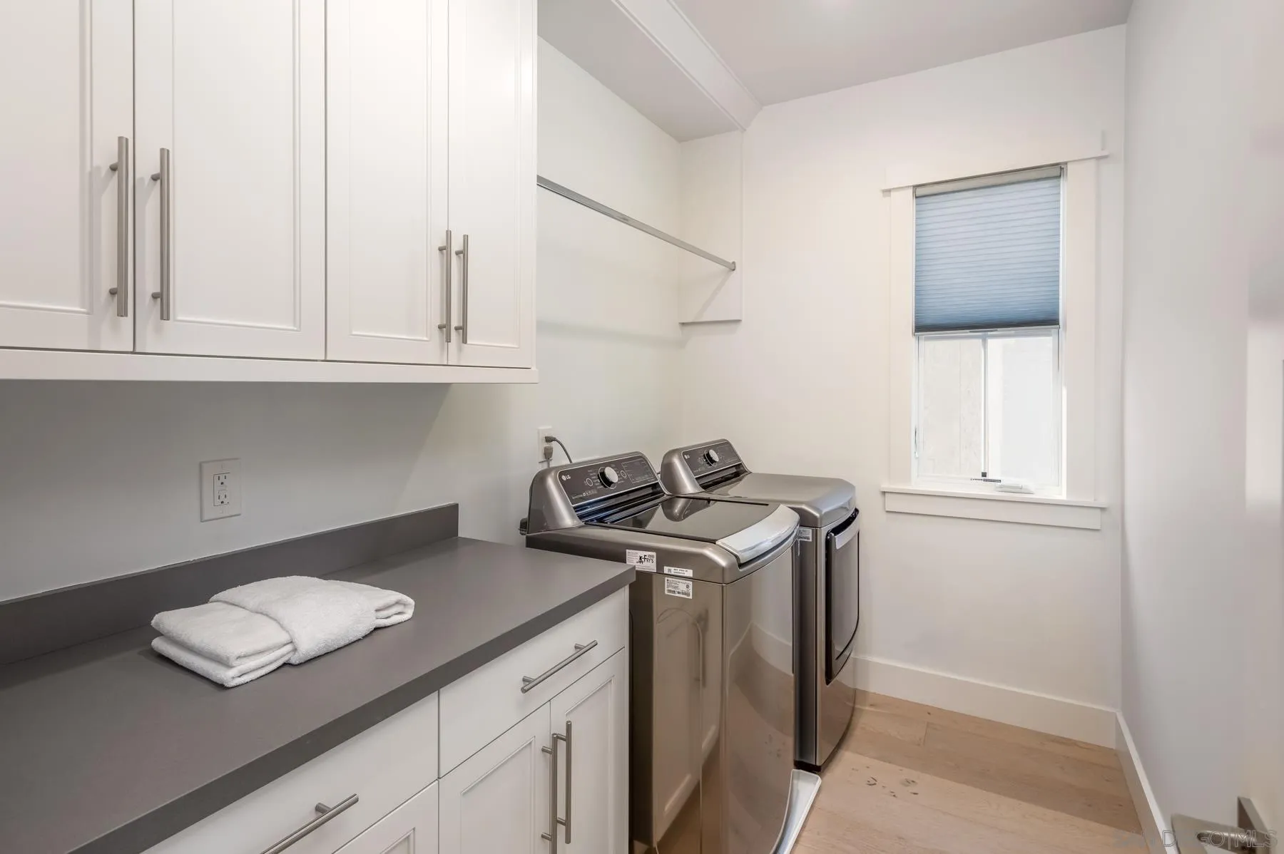 237 La Mesa Avenue Encinitas, CA 92024 - Photo 29 of 40 a kitchen with stainless steel appliances granite countertop a sink stove and cabinets