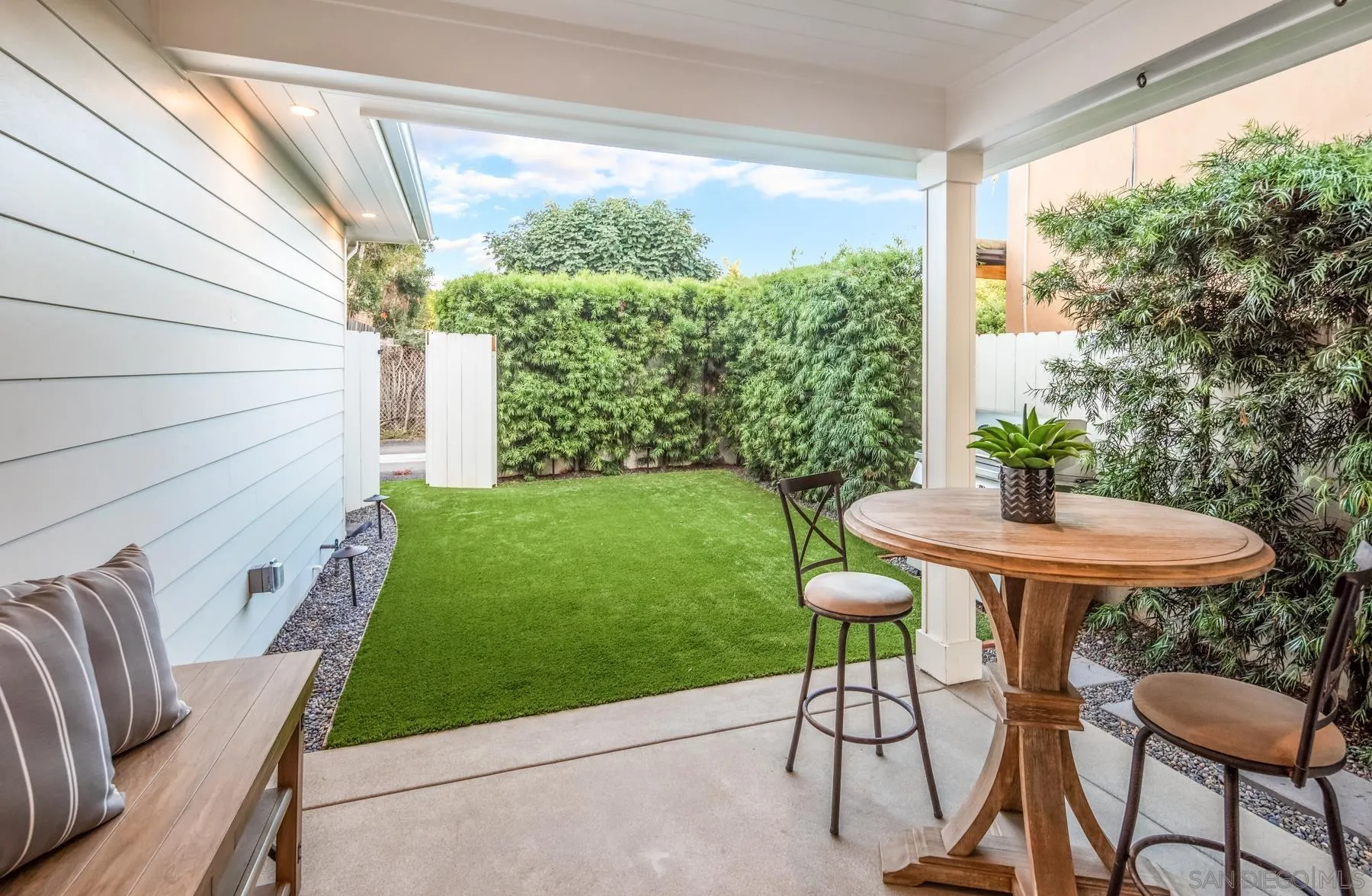 237 La Mesa Avenue Encinitas, CA 92024 - Photo 31 of 40 a view of a patio with a table chairs and a table