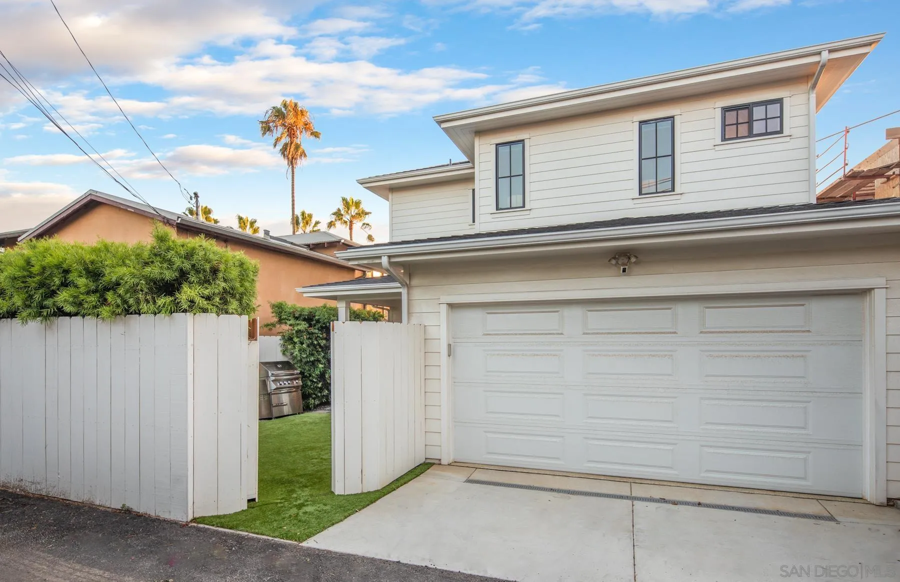 237 La Mesa Avenue Encinitas, CA 92024 - Photo 34 of 40 a front view of a house with a garage