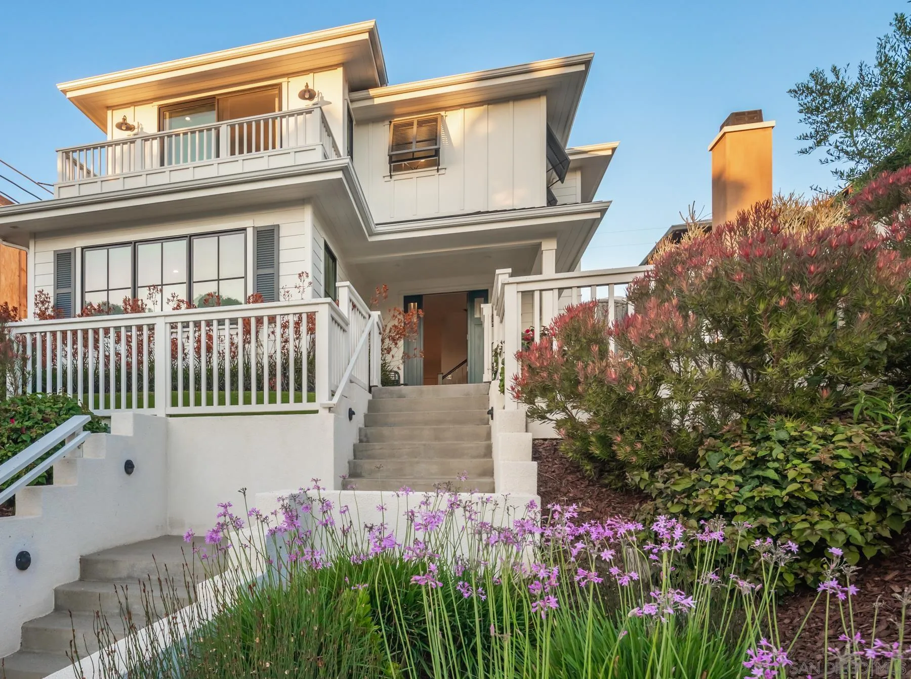 237 La Mesa Avenue Encinitas, CA 92024 - Photo 39 of 40 a front view of a house with a garden