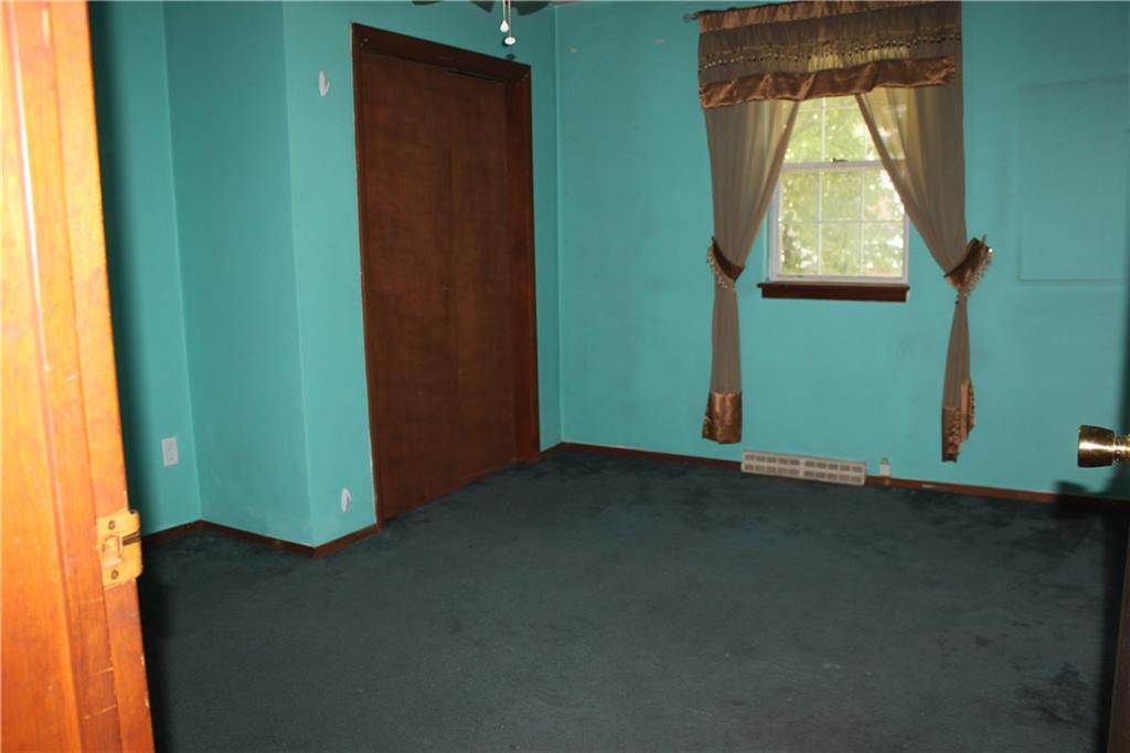 983 Monaca Road Monaca, PA 15061 - Photo 12 of 20 First floor Bedroom 1 has plenty of closet space