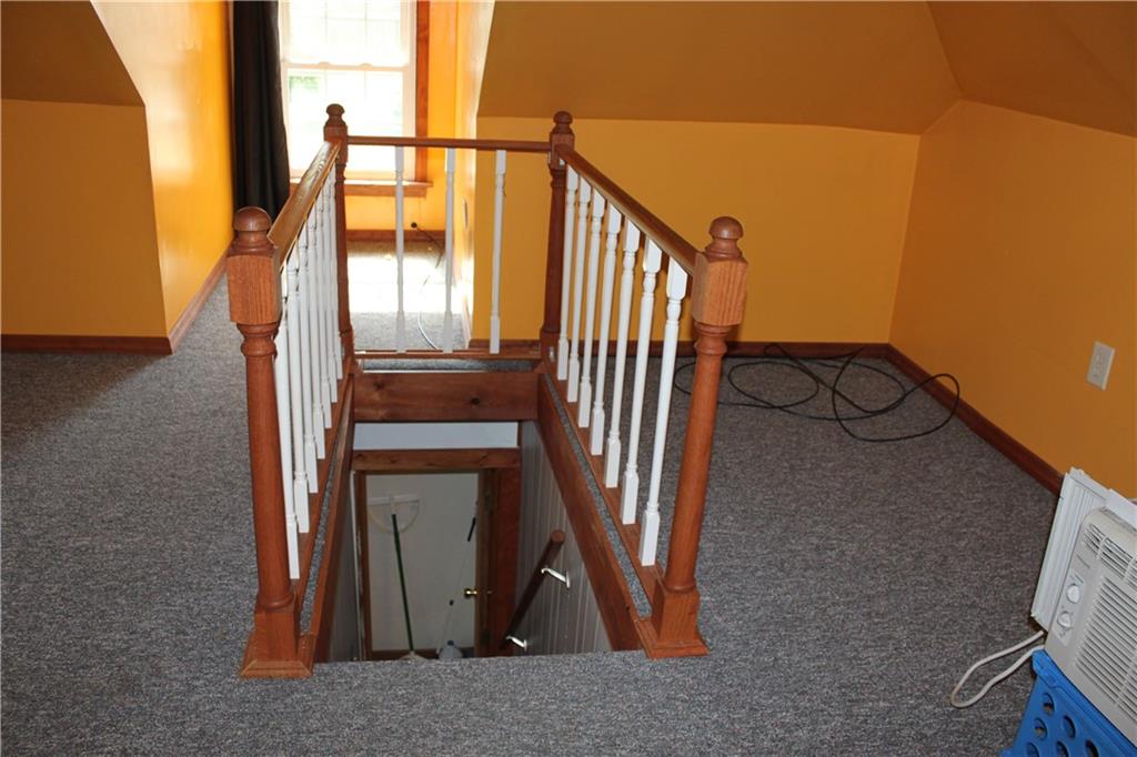 983 Monaca Road Monaca, PA 15061 - Photo 14 of 20 Upstairs Bedroom #3 spans the whole length of the house.