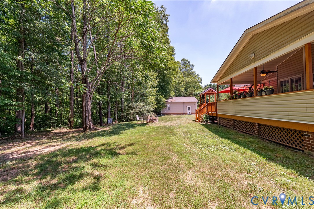 197 Goshen Road Cumberland, VA 23040 - Photo 54 of 70 Expansive grassy yard area bordered by mature tree