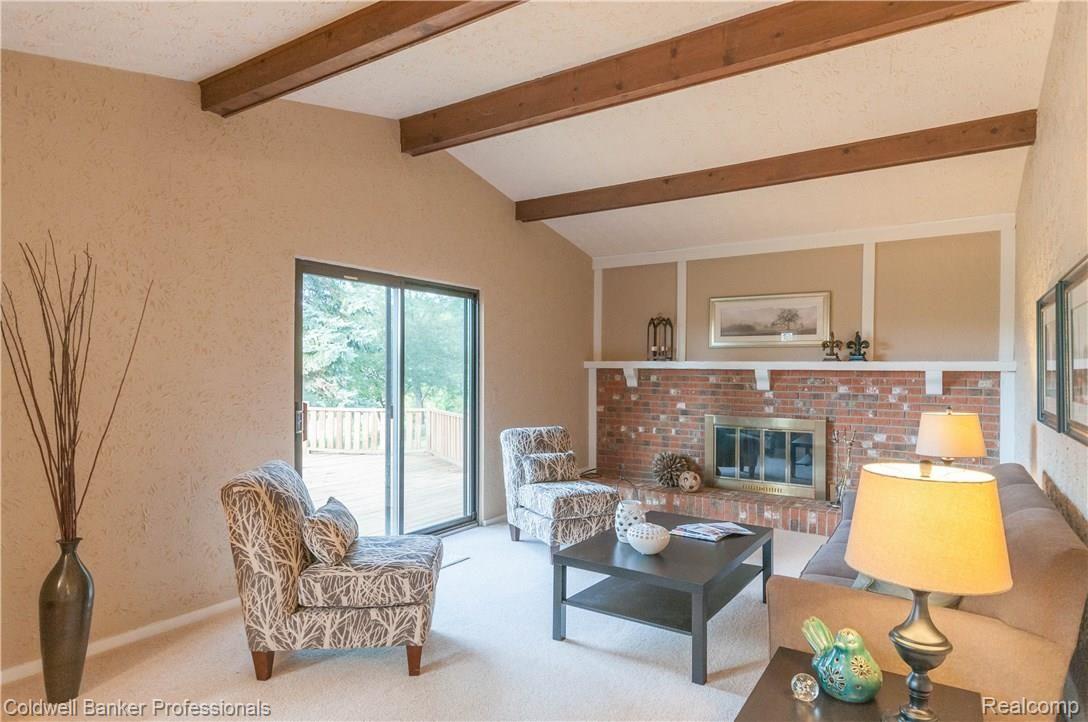 816 Dahlia Lane Rochester, MI 48307 - Photo 13 of 32 Beautiful family room with brick fireplace.