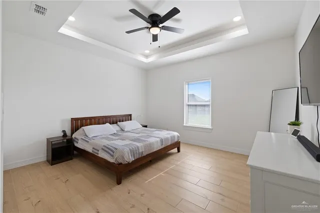 a view of a livingroom with workspace and a couch