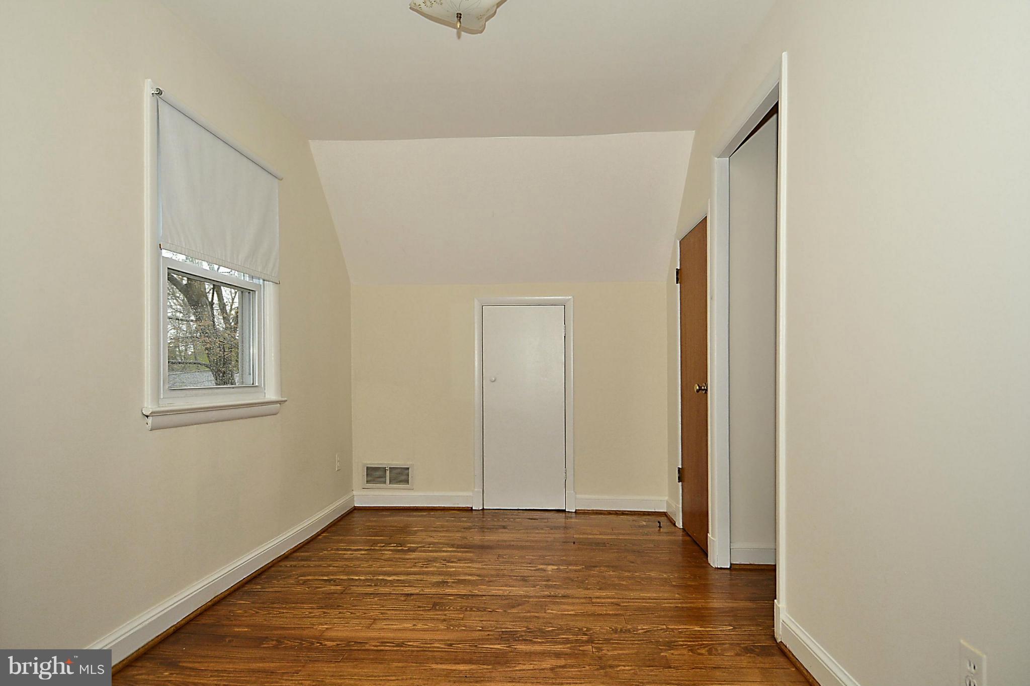 2507 Sheraton Street Silver Spring, MD 20906 - Photo 14 of 23 a view of an empty room with window and closet