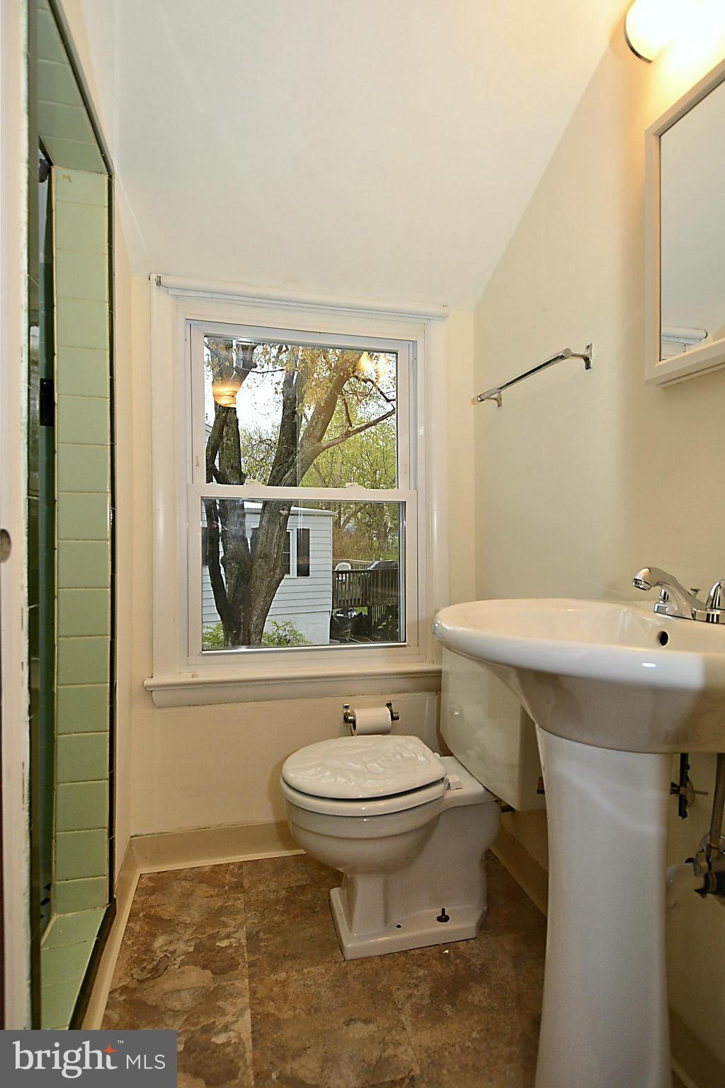 2507 Sheraton Street Silver Spring, MD 20906 - Photo 19 of 23 a bathroom with a sink toilet and shower