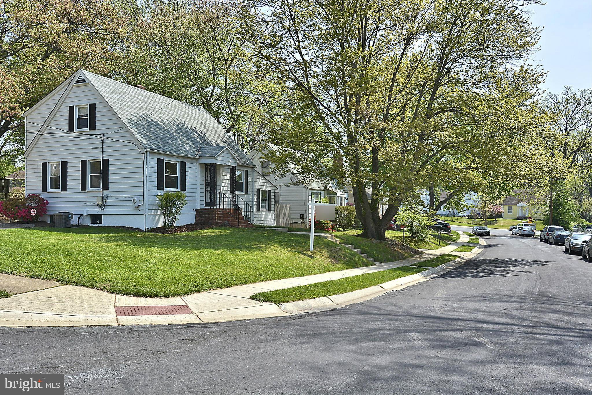 2507 Sheraton Street Silver Spring, MD 20906 - Photo 3 of 23 a front view of house with yard and green space