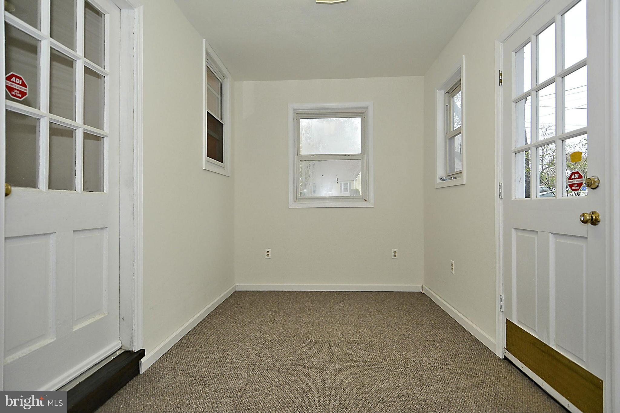 2507 Sheraton Street Silver Spring, MD 20906 - Photo 6 of 23 an empty room with windows