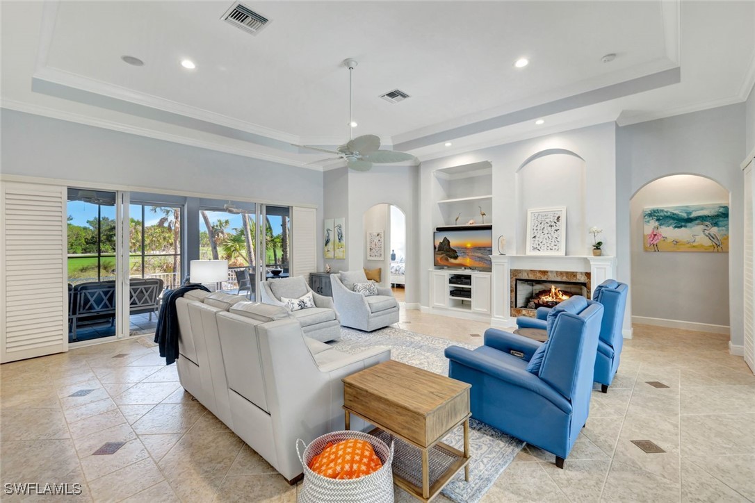 2450 Wulfert Road Sanibel, FL 33957 - Photo 15 of 44 a living room with furniture and a large window