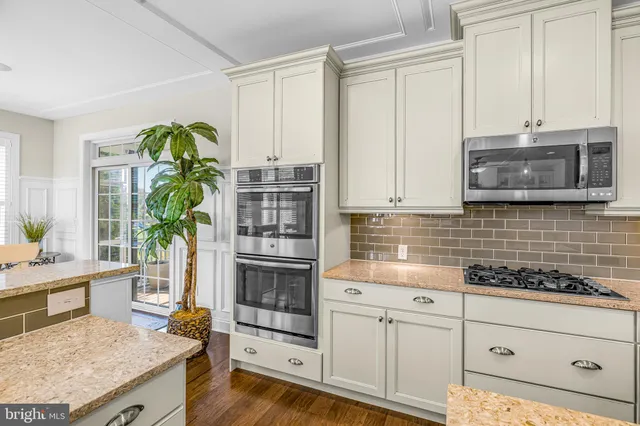 a living room with furniture fireplace and a flat screen tv