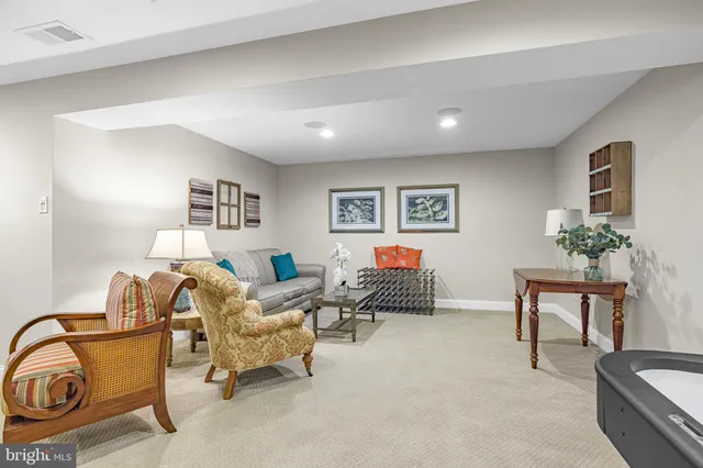 a view of a backyard with sitting area